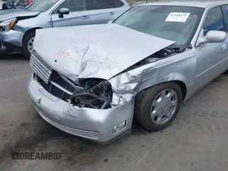 2002 Cadillac DeVille z VIN 1G6KD54Y22U108080, wystawiony jako IAAI lot #42304179 z przebiegiem 278 141 mil mil oraz . Historia ofert i sprzedaży dostępna na DreamBid. Obrazek 6.