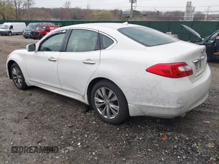 2012 Infiniti M37 with VIN JN1BY1AR6CM392969, listed as a IAAI auction lot 42021761 with 213,718 mi miles. Bid and sale history available at carsss.com. Image 3.