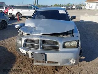 2009 Dodge Charger with VIN 2B3KA43G86H448532, listed as a IAAI auction lot 41781967 with 203,308 mi miles. Bid and sale history available at carsss.com. Image 6.