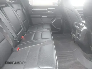 2023 Ram 1500 Laramie with VIN 1C6SRFJT3PN541901, listed as a IAAI auction lot 42156766 with 58,082 mi miles and . Bid and sale history available at DreamBid. Image 8.