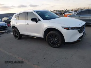 2022 Mazda CX-5 2.5 Turbo with VIN JM3KFBAY3N0600355, listed as a IAAI auction lot 41414852 with 28,913 mi miles and . Bid and sale history available at carsss.com. Image 1.