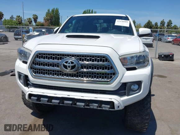 2017 Toyota Tacoma SR5 z VIN 3TMCZ5AN7HM095515, wystawiony jako IAAI lot #42150909 z przebiegiem 70 603 mil mil oraz . Historia ofert i sprzedaży dostępna na DreamBid. Obrazek 12.