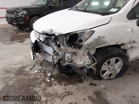 2017 Chevrolet Trax LS with VIN KL7CJNSB3HB127456, listed as a IAAI auction lot 41602979 with 73,564 mi miles. Bid and sale history available at carsss.com. Image 6.