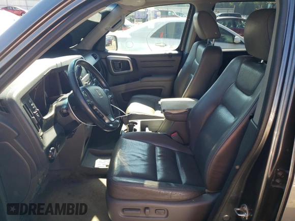 2011 Honda Ridgeline RTL with VIN 5FPYK1F51BB007802, listed as a Copart auction lot 63261935 with 397,803 mi miles and Clean title. Bid and sale history available at DreamBid. Image 7.