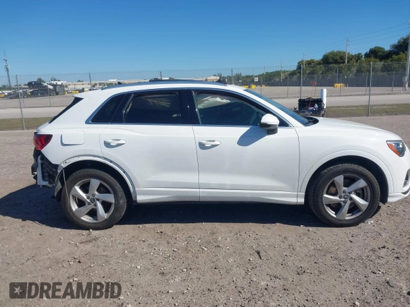 2021 Audi Q3 Premium with VIN WA1AUCF32M1097059, listed as a IAAI auction lot 41825132 with 66,144 mi miles and . Bid and sale history available at DreamBid. Image 13.