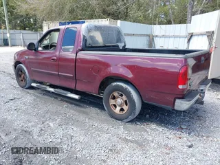 2003 Ford F-150 XL with VIN 1FTRX17203KA95359, listed as a IAAI auction lot 41891118 with 206,393 mi miles. Bid and sale history available at carsss.com. Image 3.