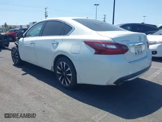 2018 Nissan Altima 2.5 SV with VIN 1N4AL3AP4JC186544, listed as a IAAI auction lot 41892390 with 113,384 mi miles. Bid and sale history available at carsss.com. Image 3.