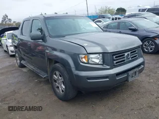 2007 Honda Ridgeline RTL w/Leather with VIN 2HJYK16537H523732, listed as a IAAI auction lot 41798931 with 219,881 mi miles. Bid and sale history available at carsss.com. Image 1.