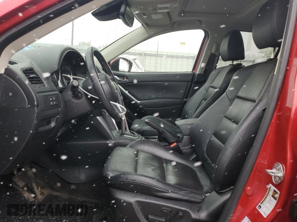 2014 Mazda CX-5 Grand Touring with VIN JM3KE4DY6E0309925, listed as a Copart auction lot 53521105 with 161,579 mi miles and Salvage Title. Bid and sale history available at carsss.com. Image 7.