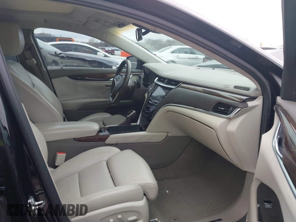 2013 Cadillac XTS Platinum z VIN 2G61V5S37D9194227, wystawiony jako IAAI lot #41510449 z przebiegiem 114 243 mil mil oraz . Historia ofert i sprzedaży dostępna na DreamBid. Obrazek 5.