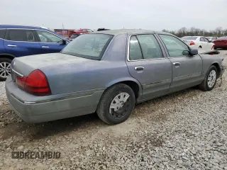 2004 Mercury Grand Marquis GS with VIN 2MEFM74W44X659873, listed as a Copart auction lot 51793205 with 115,384 mi miles and Salvage Title. Bid and sale history available at DreamBid. Image 3.