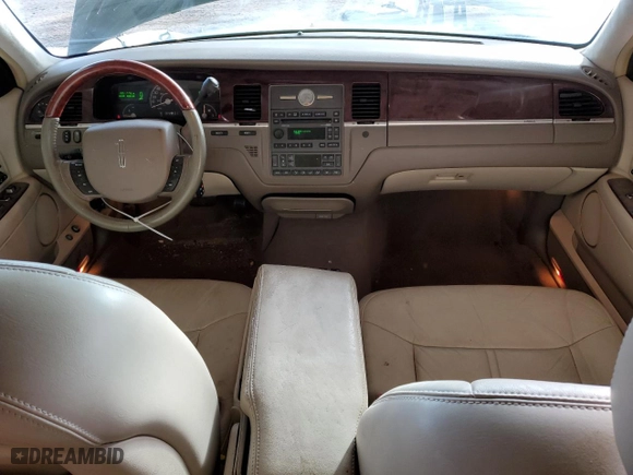 2005 Lincoln Town Car Signature Limited with VIN 1LNHM82W25Y671990, listed as a Copart auction lot 45221615 with 105,177 mi miles and Salvage Title. Bid and sale history available at carsss.com. Image 8.