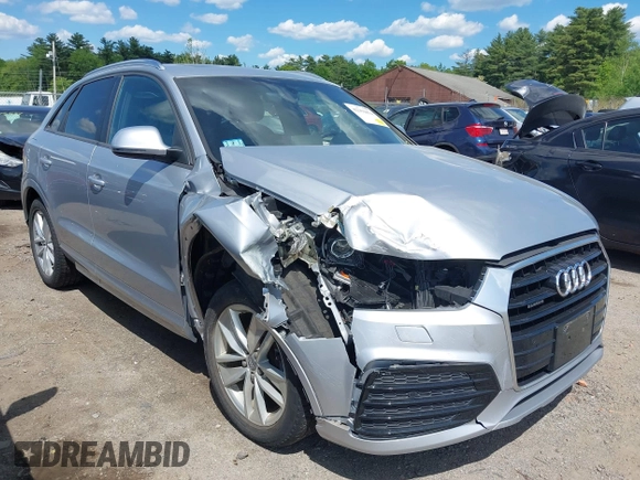 2018 Audi Q3 Premium with VIN WA1ECCFS0JR022112, listed as a IAAI auction lot 42356014 with 56,671 mi miles and . Bid and sale history available at DreamBid. Image 1.