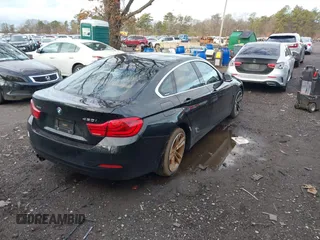 2018 BMW 4 Series 430i xDrive with VIN WBA4J3C56JBG91516, listed as a IAAI auction lot 41824273 with 102,932 mi miles and . Bid and sale history available at DreamBid. Image 4.