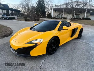 2015 McLaren 650S z VIN SBM11FAA4FW005324, wystawiony jako Copart lot #43651815 z przebiegiem 28 798 mil mil oraz Tytuł czysty. Historia ofert i sprzedaży dostępna na DreamBid. Obrazek 2.