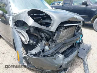 2013 MINI Countryman S ALL4 with VIN WMWZC5C58DWP30600, listed as a IAAI auction lot 42203285 with 76,796 mi miles and . Bid and sale history available at DreamBid. Image 19.