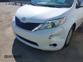 2011 Toyota Sienna XLE AAS with VIN 5TDYK3DCXBS043733, listed as a IAAI auction lot 41601544 with 221,658 mi miles and . Bid and sale history available at DreamBid. Image 6.