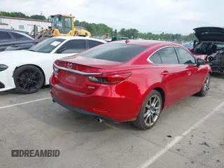 2016 Mazda 6 i Grand Touring with VIN JM1GJ1W57G1460281, listed as a IAAI auction lot 42016051 with 89,784 mi miles. Bid and sale history available at carsss.com. Image 4.