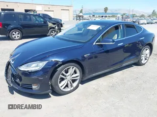 2014 Tesla Model S 60 with VIN 5YJSA1H12EFP46760, listed as a IAAI auction lot 42344596 with 106,252 mi miles and . Bid and sale history available at DreamBid. Image 2.