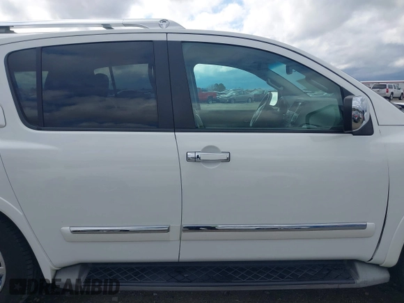 2015 Nissan Armada Platinum z VIN 5N1BA0NF9FN606276, wystawiony jako IAAI lot #41865375 z przebiegiem 223 761 mil mil oraz . Historia ofert i sprzedaży dostępna na DreamBid. Obrazek 14.