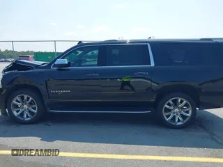 2019 Chevrolet Suburban LT with VIN 1GNSCJKC5KR304766, listed as a IAAI auction lot 42410264 with 105,171 mi miles and . Bid and sale history available at DreamBid. Image 14.