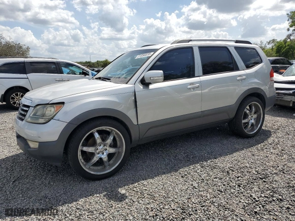 2009 Kia Borrego LX with VIN KNDJJ741395030543, listed as a Copart auction lot 51056035 with 165,448 mi miles and Salvage Title. Bid and sale history available at carsss.com. Image 1.