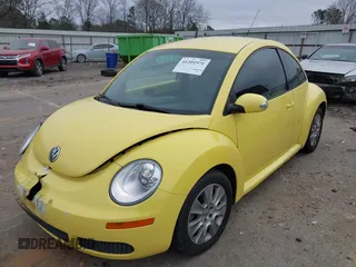 2009 Volkswagen New Beetle Coupe S with VIN 3VWPW31C59M518880, listed as a IAAI auction lot 41201971 with 99,976 mi miles. Bid and sale history available at carsss.com. Image 2.