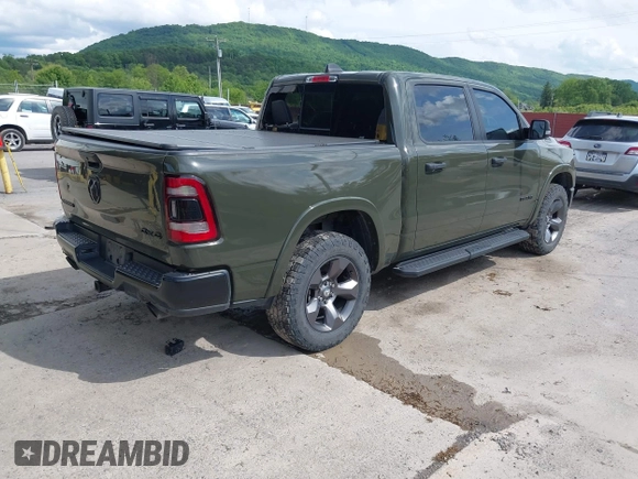 2021 Ram 1500 Big Horn with VIN 1C6SRFFT1MN669218, listed as a IAAI auction lot 42366224 with 50,230 mi miles and . Bid and sale history available at DreamBid. Image 4.