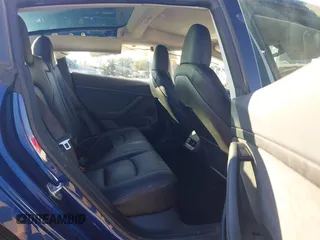 2023 Tesla Model 3 with VIN 5YJ3E1EA6PF505252, listed as a IAAI auction lot 41380172 with 31,141 mi miles and . Bid and sale history available at DreamBid. Image 8.