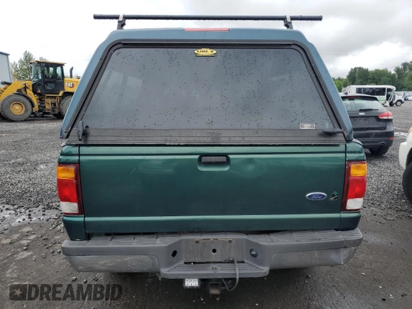 1999 Ford Ranger XL with VIN 1FTYR14V6XPA93323, listed as a Copart auction lot 59769985 with 345,075 mi miles and Salvage title. Bid and sale history available at DreamBid. Image 6.