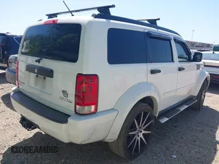 2011 Dodge Nitro Heat with VIN 1D4PT4GX9BW587284, listed as a IAAI auction lot 41998357 with 100,366 mi miles and . Bid and sale history available at DreamBid. Image 4.