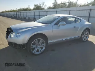 2013 Bentley Continental GT with VIN SCBFT7ZA1DC085265, listed as a Copart auction lot 76097134 with 14,756 mi miles and Salvage Title. Bid and sale history available at DreamBid. Image 1.