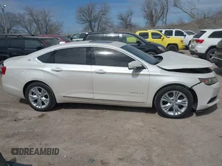 2014 Chevrolet Impala LT with VIN 1G1115SL2EU127217, listed as a IAAI auction lot 41847203 with 95,023 mi miles and . Bid and sale history available at DreamBid. Image 14.