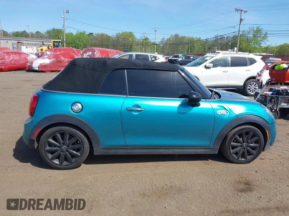 2019 MINI Convertible Cooper S с VIN WMWWG9C54K3E41195, выставлен на аукционе IAAI как лот 42149191 с пробегом 80 033 миль миль и . История ставок и продаж доступна на DreamBid. Изображение 13.