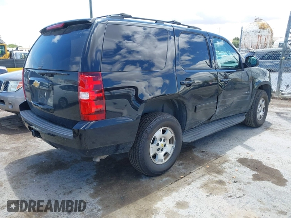2013 Chevrolet Tahoe LS with VIN 1GNSCAE04DR104790, listed as a IAAI auction lot 42225652 with 119,948 mi miles and . Bid and sale history available at DreamBid. Image 4.