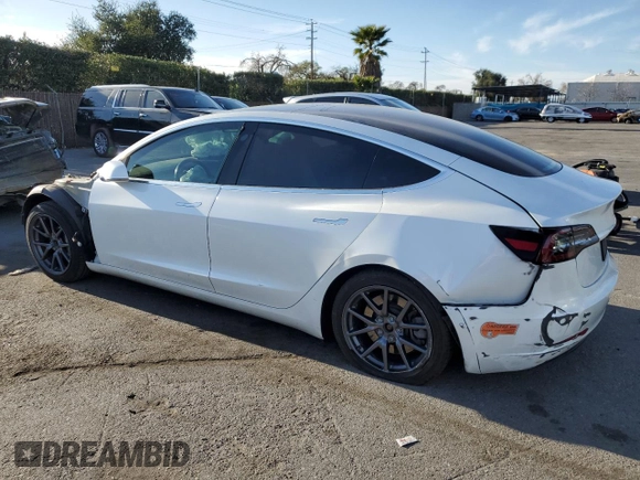 2020 Tesla Model 3 Standard Range Plus with VIN 5YJ3E1EA0LF808571, listed as a Copart auction lot 47827615 with 125,444 mi miles and Salvage Title. Bid and sale history available at DreamBid. Image 2.
