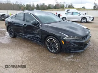 2023 Kia K5 GT-Line z VIN 5XXG64J28PG206566, wystawiony jako IAAI lot #41816536 z przebiegiem 30 952 mil mil oraz . Historia ofert i sprzedaży dostępna na DreamBid. Obrazek 1.
