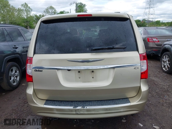 2011 Chrysler Town & Country Touring L z VIN 2A4RR8DG6BR677303, wystawiony jako IAAI lot #42168348 z przebiegiem 237 886 mil mil oraz . Historia ofert i sprzedaży dostępna na DreamBid. Obrazek 16.