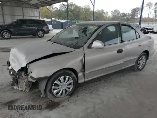 2000 Hyundai Elantra GLS z VIN KMHJF35F5YU001615, wystawiony jako Copart lot #45038845 z przebiegiem 160 850 mil mil oraz Nie do naprawy • Non repairable. Historia ofert i sprzedaży dostępna na DreamBid. Obrazek 1.