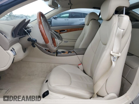2003 Mercedes-Benz SL 500 с VIN WDBSK75F73F062035, выставлен на аукционе Copart как лот 56296375 с пробегом 46 156 миль миль и Списание • Salvage title. История ставок и продаж доступна на DreamBid. Изображение 7.