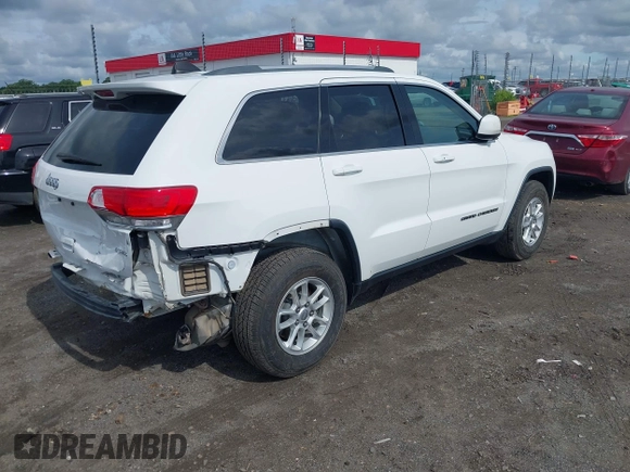 2018 Jeep Grand Cherokee Altitude with VIN 1C4RJFAGXJC419234, listed as a IAAI auction lot 42333938 with 148,695 mi miles and . Bid and sale history available at DreamBid. Image 4.