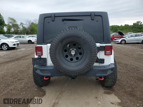 2016 Jeep Wrangler Unlimited Rubicon with VIN 1C4HJWFG9GL223928, listed as a Copart auction lot 58182125 with 57,711 mi miles and Salvage title. Bid and sale history available at DreamBid. Image 6.