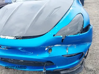 2021 Tesla Model Y Performance z VIN 5YJYGDEF8MF209819, wystawiony jako IAAI lot #41757009 z przebiegiem 37 685 mil mil oraz . Historia ofert i sprzedaży dostępna na DreamBid. Obrazek 21.