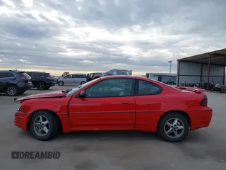 2004 Pontiac Grand Am z VIN 1G2NV12EX4M641018, wystawiony jako IAAI lot #41255352 z przebiegiem 144 385 mil mil oraz . Historia ofert i sprzedaży dostępna na DreamBid. Obrazek 15.