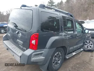 2014 Nissan Xterra X with VIN 5N1AN0NW5EN810488, listed as a IAAI auction lot 41705791 with 127,936 mi miles and . Bid and sale history available at DreamBid. Image 4.