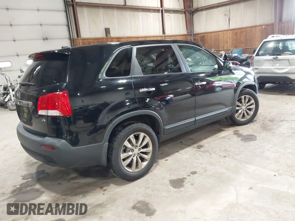 2011 Kia Sorento EX with VIN 5XYKU3A11BG018557, listed as a IAAI auction lot 42245522 with 107,106 mi miles and . Bid and sale history available at DreamBid. Image 4.