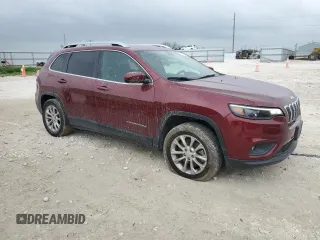 2019 Jeep Cherokee Latitude with VIN 1C4PJLCB0KD203797, listed as a Copart auction lot 51386735 with 127,924 mi miles and Salvage Title. Bid and sale history available at carsss.com. Image 4.