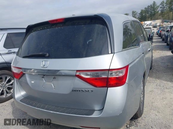 2012 Honda Odyssey EX-L with VIN 5FNRL5H66CB069916, listed as a IAAI auction lot 41935248 with 230,204 mi miles and . Bid and sale history available at carsss.com. Image 4.