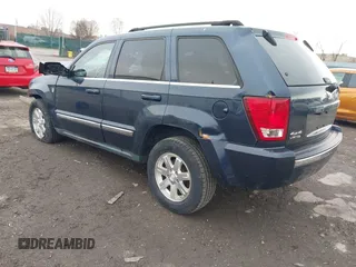 2009 Jeep Grand Cherokee Limited with VIN 1J8HR58P89C542314, listed as a IAAI auction lot 41880894 with 103,032 mi miles and . Bid and sale history available at DreamBid. Image 3.