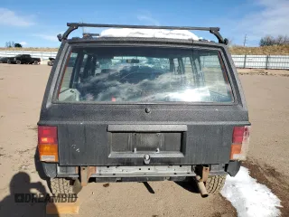 1990 Jeep Cherokee z VIN 1J4FJ28L1LL100736, wystawiony jako Copart lot #81339574 z przebiegiem 160 363 mil mil oraz Czysty tytuł • Clean title. Historia ofert i sprzedaży dostępna na DreamBid. Obrazek 6.